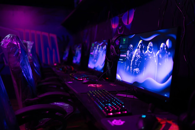 Gaming setup with RGB lighting and mechanical keyboard at Arcadium Karachi